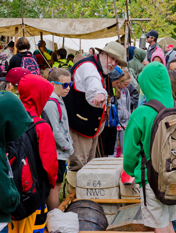 Fur trader teaching school kids